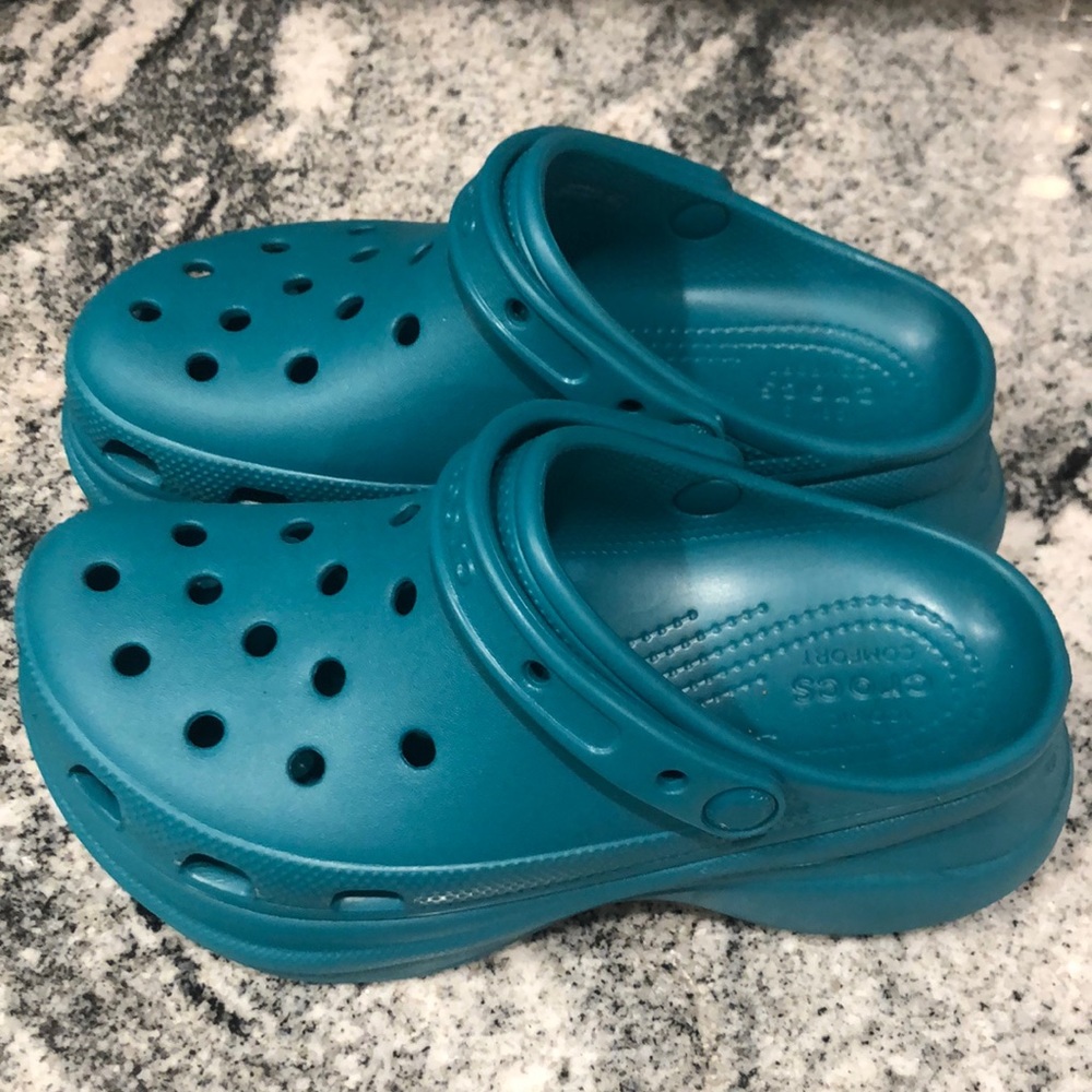 Turquoise Crocs size 7
